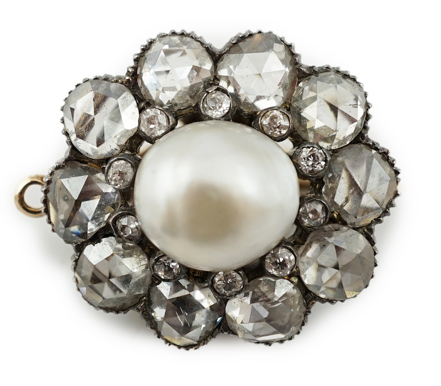 A 19th century gold and silver, single stone natural saltwater part drilled button pearl and rose and round cut diamond cluster set pendant brooch